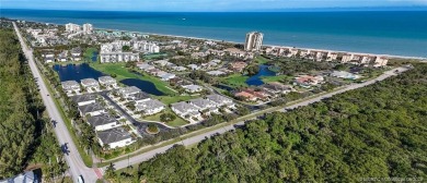 This first-floor, corner condo in Beachtree I within Ocean on Ocean Village Golf Course in Florida - for sale on GolfHomes.com, golf home, golf lot