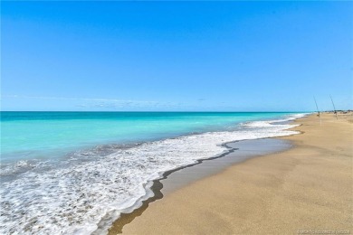 This first-floor, corner condo in Beachtree I within Ocean on Ocean Village Golf Course in Florida - for sale on GolfHomes.com, golf home, golf lot