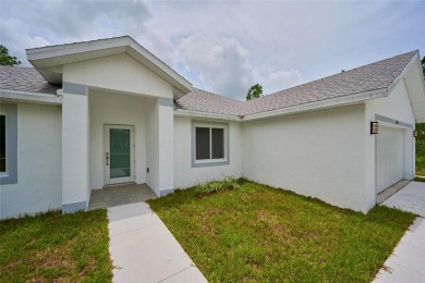 Beautiful new construction in Indian Lake Estates! A golf and on Indian Lake Estates Golf and Country Club in Florida - for sale on GolfHomes.com, golf home, golf lot