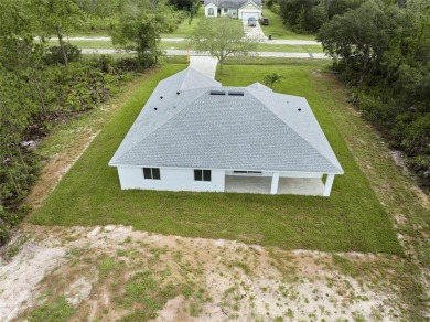 Beautiful new construction in Indian Lake Estates! A golf and on Indian Lake Estates Golf and Country Club in Florida - for sale on GolfHomes.com, golf home, golf lot