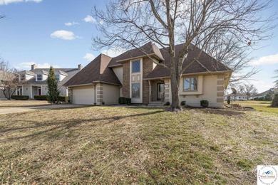 Stunning home located on the 9th hole of Meadow Lake Golf Course on Meadow Lake Golf Course in Missouri - for sale on GolfHomes.com, golf home, golf lot