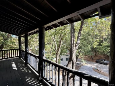 A true mountain escape in a premier Moonridge location--just a on Big Bear Mountain Ski and Golf Resort in California - for sale on GolfHomes.com, golf home, golf lot