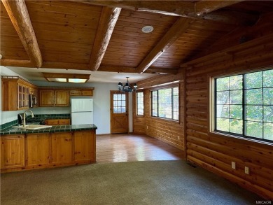 A true mountain escape in a premier Moonridge location--just a on Big Bear Mountain Ski and Golf Resort in California - for sale on GolfHomes.com, golf home, golf lot