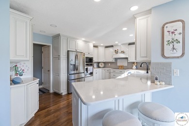 Stunning home located on the 9th hole of Meadow Lake Golf Course on Meadow Lake Golf Course in Missouri - for sale on GolfHomes.com, golf home, golf lot