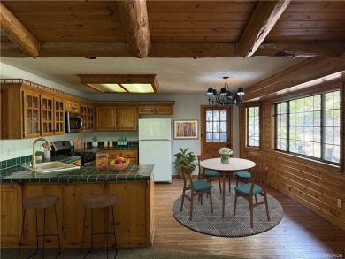 A true mountain escape in a premier Moonridge location--just a on Big Bear Mountain Ski and Golf Resort in California - for sale on GolfHomes.com, golf home, golf lot