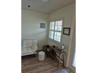 Unlock the door to a vibrant lifestyle in stunning 1 BR, 1 BA on The American Golf Club in Florida - for sale on GolfHomes.com, golf home, golf lot