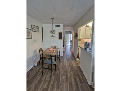 Unlock the door to a vibrant lifestyle in stunning 1 BR, 1 BA on The American Golf Club in Florida - for sale on GolfHomes.com, golf home, golf lot