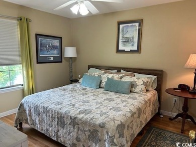 This corner unit golf course condo is tucked away in a serene on True Blue Plantation in South Carolina - for sale on GolfHomes.com, golf home, golf lot