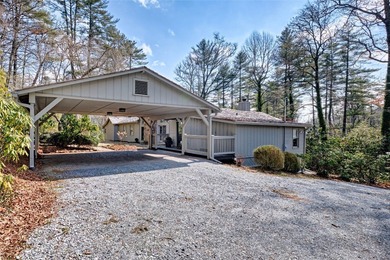 Nestled in the heart of High Hampton, this charming one-level on High Hampton Inn and Country Club in North Carolina - for sale on GolfHomes.com, golf home, golf lot