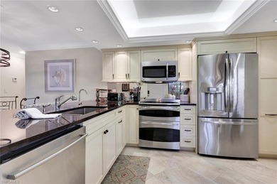 Step into this beautifully renovated, first-floor corner on Foxfire Golf and Country Club  in Florida - for sale on GolfHomes.com, golf home, golf lot