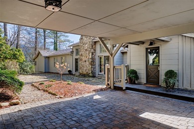 Nestled in the heart of High Hampton, this charming one-level on High Hampton Inn and Country Club in North Carolina - for sale on GolfHomes.com, golf home, golf lot