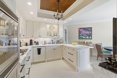 With individual pool cabanas, beachside towel service, tennis on Palm Beach Par-3 Golf Course in Florida - for sale on GolfHomes.com, golf home, golf lot