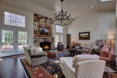 Nestled in the heart of High Hampton, this charming one-level on High Hampton Inn and Country Club in North Carolina - for sale on GolfHomes.com, golf home, golf lot