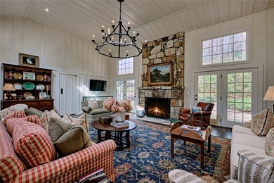 Nestled in the heart of High Hampton, this charming one-level on High Hampton Inn and Country Club in North Carolina - for sale on GolfHomes.com, golf home, golf lot