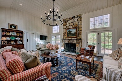Nestled in the heart of High Hampton, this charming one-level on High Hampton Inn and Country Club in North Carolina - for sale on GolfHomes.com, golf home, golf lot
