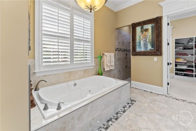 A custom masterpiece of luxury & craftmanship in the highly on Savannah Quarters Country Club in Georgia - for sale on GolfHomes.com, golf home, golf lot