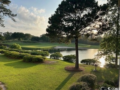 This corner unit golf course condo is tucked away in a serene on True Blue Plantation in South Carolina - for sale on GolfHomes.com, golf home, golf lot