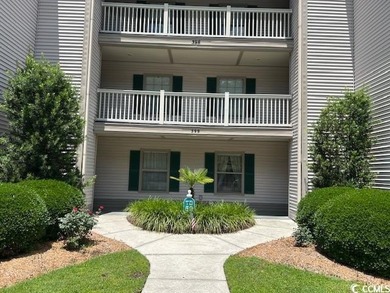 This corner unit golf course condo is tucked away in a serene on True Blue Plantation in South Carolina - for sale on GolfHomes.com, golf home, golf lot