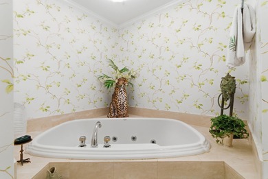 With individual pool cabanas, beachside towel service, tennis on Palm Beach Par-3 Golf Course in Florida - for sale on GolfHomes.com, golf home, golf lot