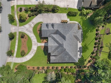 A custom masterpiece of luxury & craftmanship in the highly on Savannah Quarters Country Club in Georgia - for sale on GolfHomes.com, golf home, golf lot