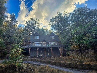 Tucked beneath majestic oaks and pines, this 3 bedroom, 2 bath on Big Bear Mountain Ski and Golf Resort in California - for sale on GolfHomes.com, golf home, golf lot