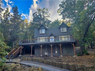Tucked beneath majestic oaks and pines, this 3 bedroom, 2 bath on Big Bear Mountain Ski and Golf Resort in California - for sale on GolfHomes.com, golf home, golf lot
