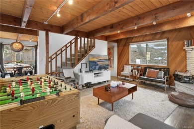 Tucked beneath majestic oaks and pines, this 3 bedroom, 2 bath on Big Bear Mountain Ski and Golf Resort in California - for sale on GolfHomes.com, golf home, golf lot