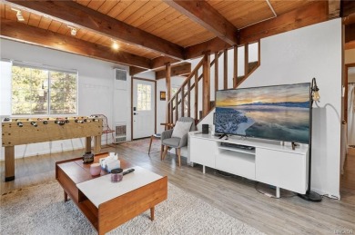 Tucked beneath majestic oaks and pines, this 3 bedroom, 2 bath on Big Bear Mountain Ski and Golf Resort in California - for sale on GolfHomes.com, golf home, golf lot