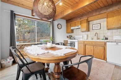 Tucked beneath majestic oaks and pines, this 3 bedroom, 2 bath on Big Bear Mountain Ski and Golf Resort in California - for sale on GolfHomes.com, golf home, golf lot