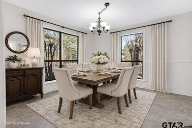 This comfortable home is nestled back in the pine trees on a on Hide-A-Way Lake Golf Course in Texas - for sale on GolfHomes.com, golf home, golf lot