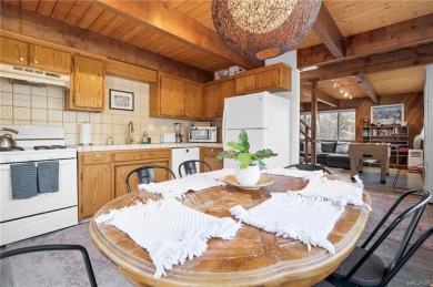 Tucked beneath majestic oaks and pines, this 3 bedroom, 2 bath on Big Bear Mountain Ski and Golf Resort in California - for sale on GolfHomes.com, golf home, golf lot
