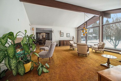 Sprawling brick ranch on a quiet culdesac overlooking the #11 on Travis Pointe Country Club in Michigan - for sale on GolfHomes.com, golf home, golf lot