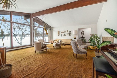 Sprawling brick ranch on a quiet culdesac overlooking the #11 on Travis Pointe Country Club in Michigan - for sale on GolfHomes.com, golf home, golf lot