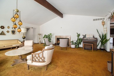 Sprawling brick ranch on a quiet culdesac overlooking the #11 on Travis Pointe Country Club in Michigan - for sale on GolfHomes.com, golf home, golf lot