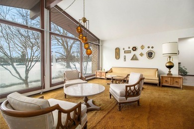 Sprawling brick ranch on a quiet culdesac overlooking the #11 on Travis Pointe Country Club in Michigan - for sale on GolfHomes.com, golf home, golf lot