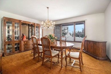 Sprawling brick ranch on a quiet culdesac overlooking the #11 on Travis Pointe Country Club in Michigan - for sale on GolfHomes.com, golf home, golf lot