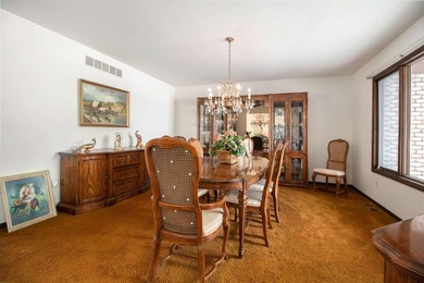 Sprawling brick ranch on a quiet culdesac overlooking the #11 on Travis Pointe Country Club in Michigan - for sale on GolfHomes.com, golf home, golf lot