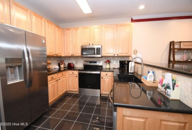 Pretty 3-bedroom top floor end unit with lots of upgrades and on Crow Creek Golf Club in North Carolina - for sale on GolfHomes.com, golf home, golf lot