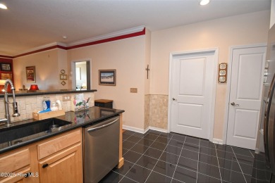 Pretty 3-bedroom top floor end unit with lots of upgrades and on Crow Creek Golf Club in North Carolina - for sale on GolfHomes.com, golf home, golf lot