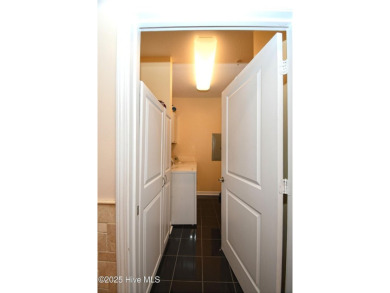 Pretty 3-bedroom top floor end unit with lots of upgrades and on Crow Creek Golf Club in North Carolina - for sale on GolfHomes.com, golf home, golf lot