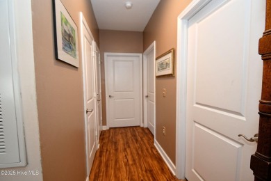 Pretty 3-bedroom top floor end unit with lots of upgrades and on Crow Creek Golf Club in North Carolina - for sale on GolfHomes.com, golf home, golf lot