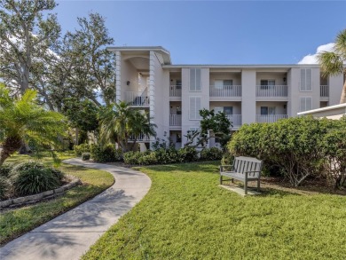 This first floor condo sits steps away from the community pool on Plantation Golf and Country Club in Florida - for sale on GolfHomes.com, golf home, golf lot
