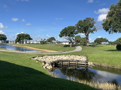 True corner ground floor end unit Burgundy 'F' bldg. Park right on Kings Point Golf -Flanders Way in Florida - for sale on GolfHomes.com, golf home, golf lot