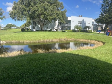 True corner ground floor end unit Burgundy 'F' bldg. Park right on Kings Point Golf -Flanders Way in Florida - for sale on GolfHomes.com, golf home, golf lot