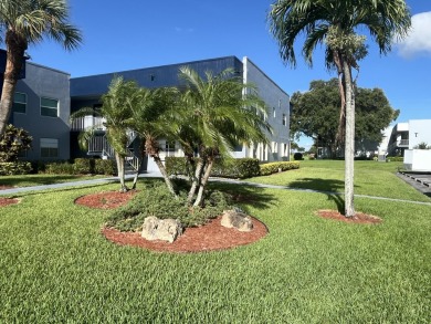True corner ground floor end unit Burgundy 'F' bldg. Park right on Kings Point Golf -Flanders Way in Florida - for sale on GolfHomes.com, golf home, golf lot
