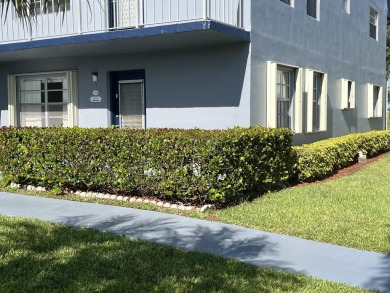 True corner ground floor end unit Burgundy 'F' bldg. Park right on Kings Point Golf -Flanders Way in Florida - for sale on GolfHomes.com, golf home, golf lot