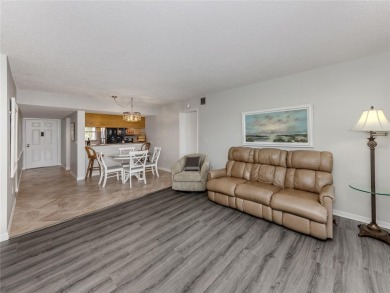 This first floor condo sits steps away from the community pool on Plantation Golf and Country Club in Florida - for sale on GolfHomes.com, golf home, golf lot