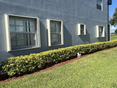 True corner ground floor end unit Burgundy 'F' bldg. Park right on Kings Point Golf -Flanders Way in Florida - for sale on GolfHomes.com, golf home, golf lot
