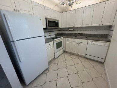 True corner ground floor end unit Burgundy 'F' bldg. Park right on Kings Point Golf -Flanders Way in Florida - for sale on GolfHomes.com, golf home, golf lot