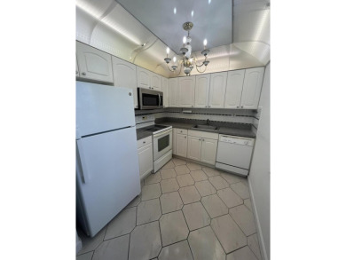 True corner ground floor end unit Burgundy 'F' bldg. Park right on Kings Point Golf -Flanders Way in Florida - for sale on GolfHomes.com, golf home, golf lot